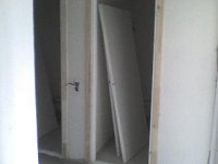 4 - Двери в санузлы - фото от проема двери в зал.JPG