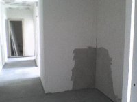 19 - Коридор и часть закутка около кухни - фото из проема первого при входе в квартиру санузла.JPG