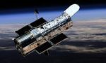 Hubble обнаружил галактику, похожую на булочку с корицей 14